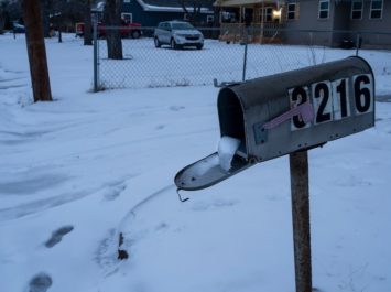 A mailbox is seen frozen in a snow covered neighborhood in Waco, Texas, as severe winter weather conditions forced road closures and power outages over the state on February 17, 2021. / Photo Credit: Matthew Busch/AFP via Getty Images